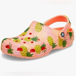 Pineapple unisex crocs. Papaya color w/pineapples. 5 men/7 women. Never worn.